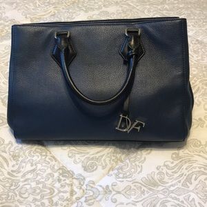 Used DVF purse in good condition blue and black